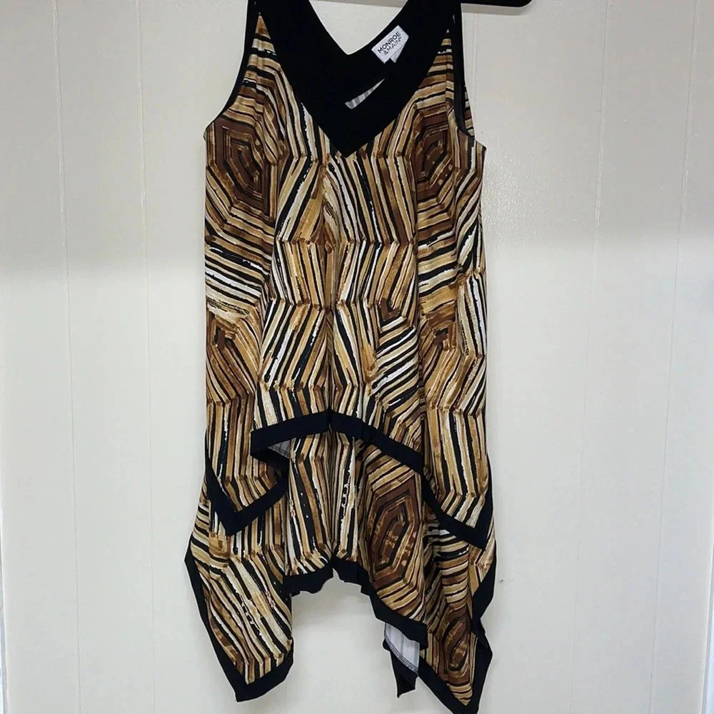 Monroe & Main Sleeveless Tiered Top